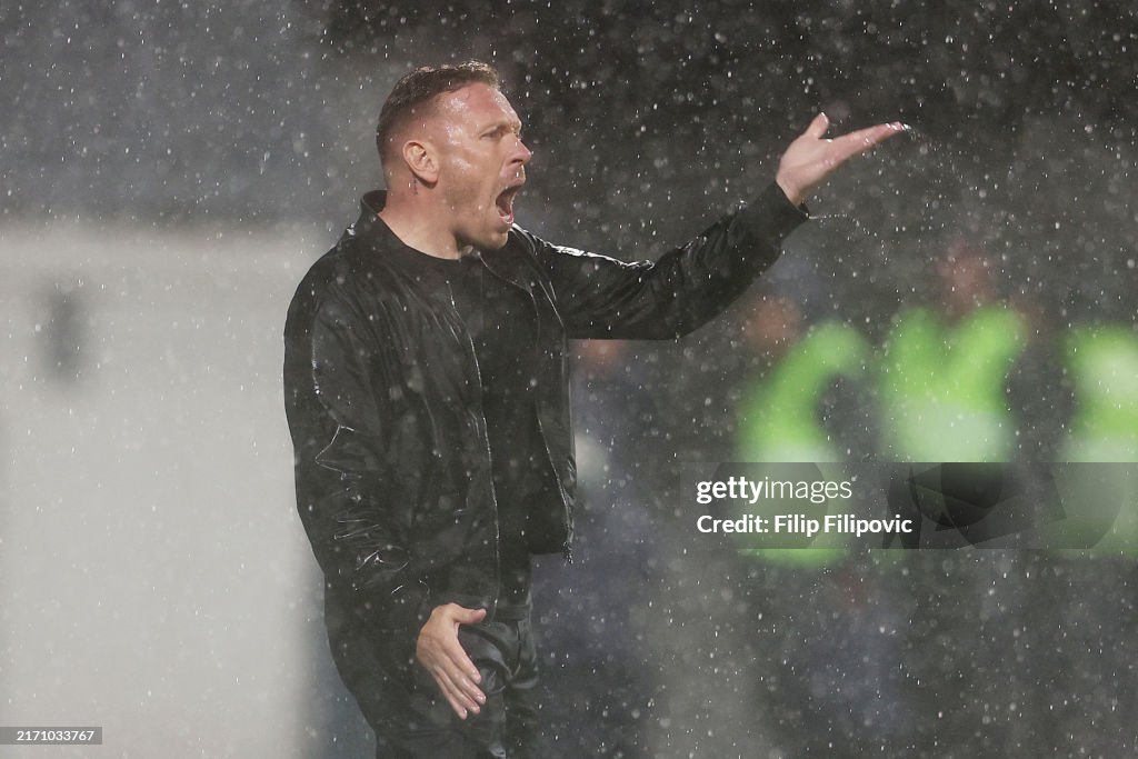 Rain Man Craig Bellamy Needs A New Jacket, But Is Proud After Wales Weather Storm